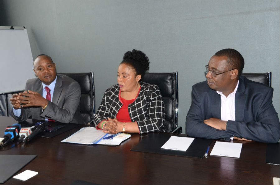 The Executive Director of the East African Business Council, Hon Peter Mathuki (left), at the media briefing. With him are Kenya's EAC Principal Secretary Dr. Margret Mwakima and Mr. Kenneth Bagamuhunda, the Director General, Customs and Trade at the EAC Secretariat.