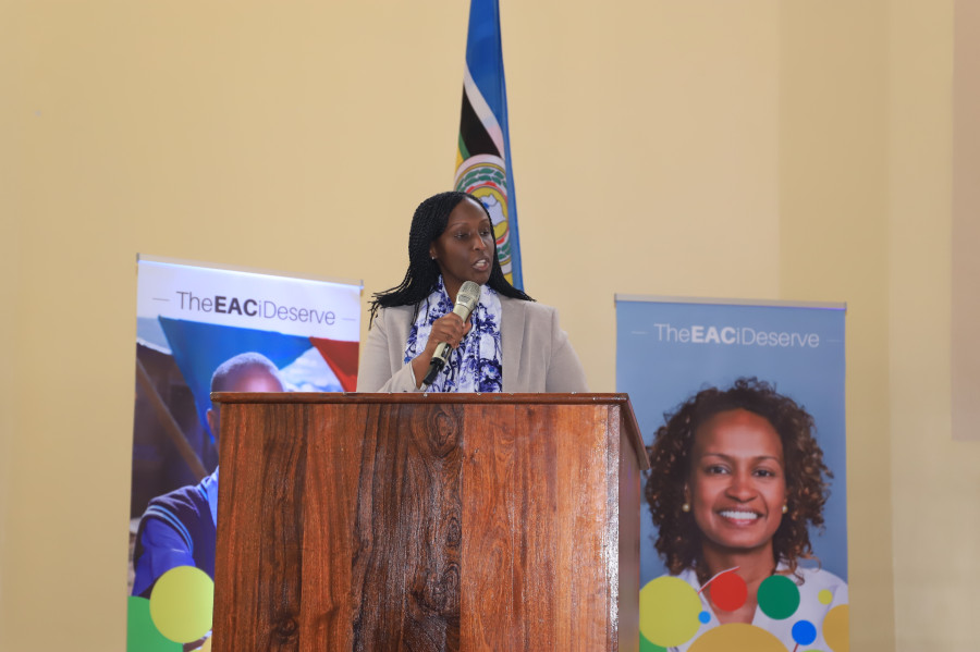 The Director General of African Cooperation in Rwanda's Ministry of Foreign Affairs and International Cooperation, Ms. Diyana Gitera, addressing participants during the launch of the 'EAC I Deserve' Campaign at the University of Rwanda in Kigali.