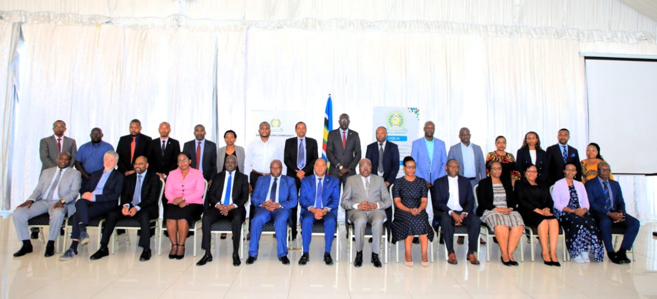 EAC Secretary General Hon. (Dr.) Peter Mathuki, the Judge President of the East African Court of Justice, Justice Nestor Kayobera and the Speaker of the East African Legislative Assembly, Hon. Joseph Ntakirutimana (seated front row), in a group photo with other dignitaries and newly sworn in EAC members in Arusha.