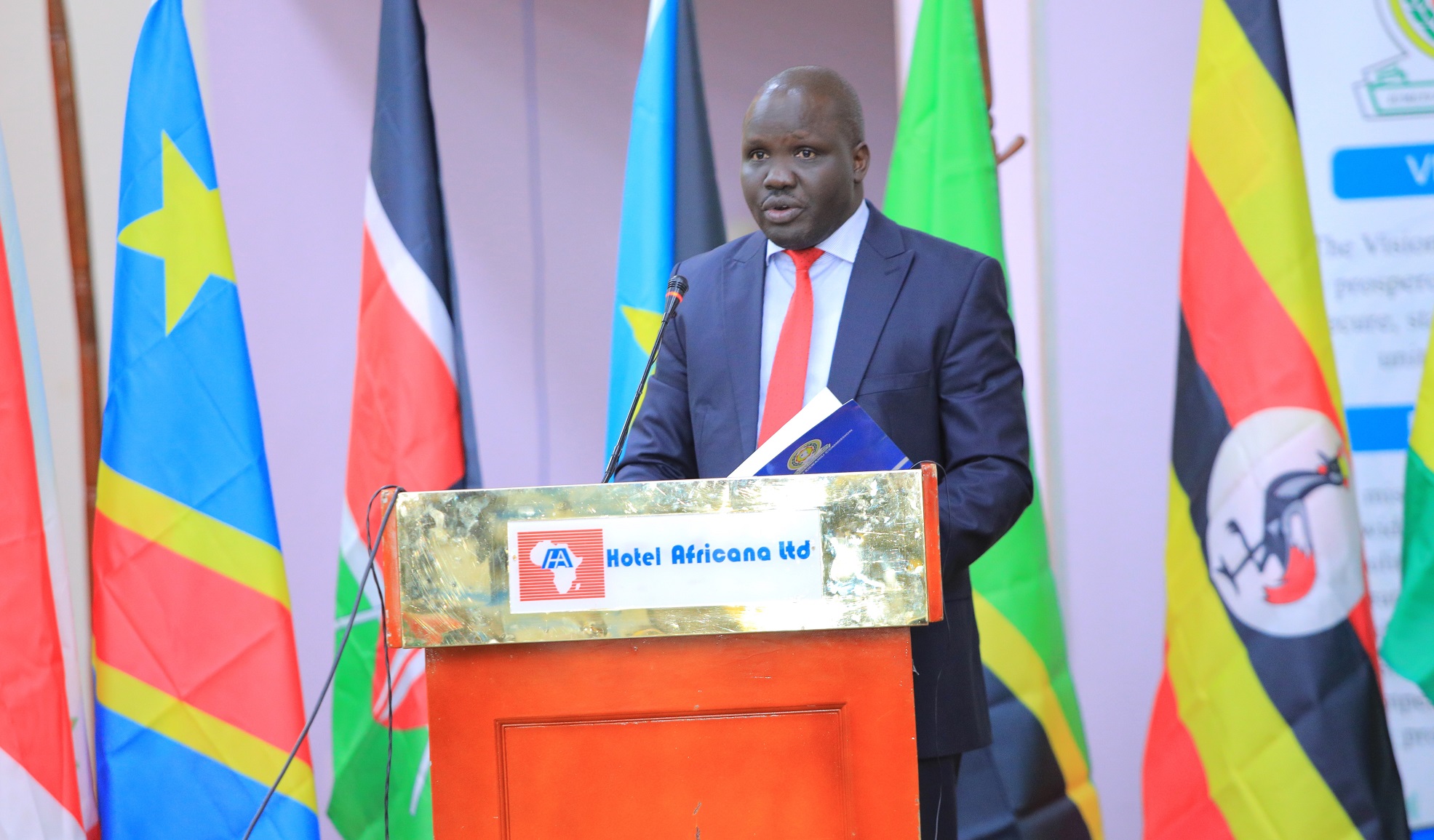 The EAC Deputy Secretary in charge of Infrastructure, Productive, Social and Political Sectors, Hon. Andrea Aguer Ariik Malueth, speaks during the 2nd EAC World Kiswahili Day celebrations in Kampala. Hon. Malueth represented the EAC Secretary General, Hon. (Dr.) Peter Mutuki Mathuki.