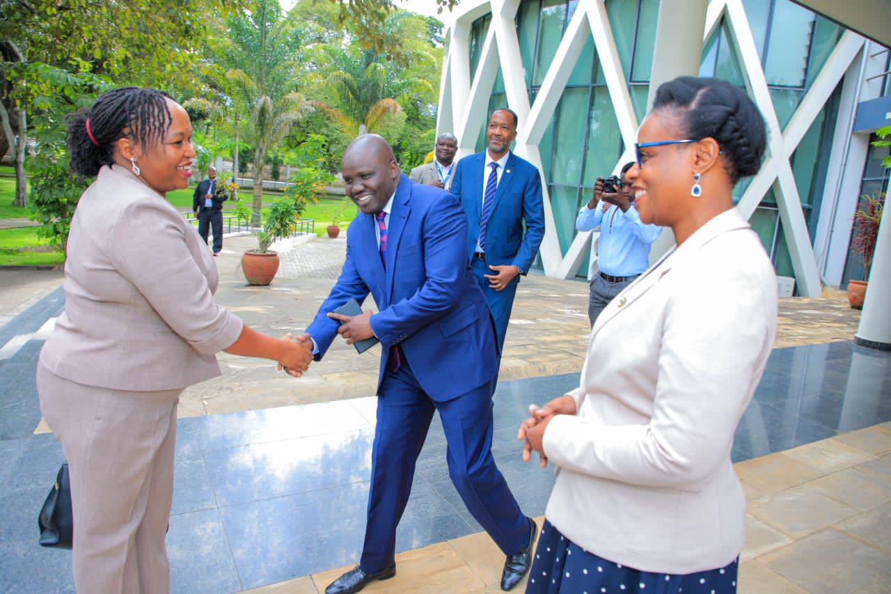 DSG - in charge of Infrastructure, Productive, Social and Political Sectors, Hon. Andrea Aguer Ariik Malueth welcomed  the new EAC Secretary General at the EAC HQ. Looking on, Ms. Annette Mutaawe Ssemuwemba