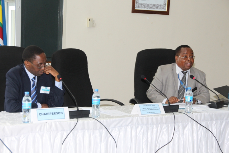 The EAC Director of Planning Mr. Wilberforce Mariki( L) making opening remarks during Senior Officials Session