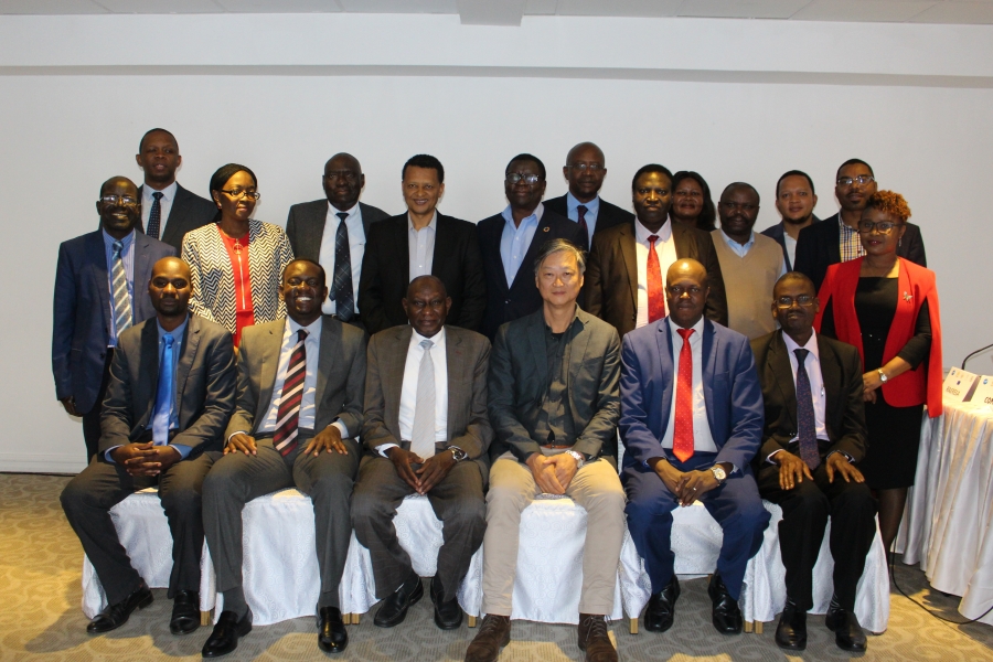 Group Picture: Seated left to right: Eng. Man’arai Ndovorwi from Regional Energy Regulators Association; Graham Ching’ambu, the Program Manager - Infrastructure, European Union in Zambia; Dr. Mohamedain Seif Elnasr, the Chief Executive Officer of the COMESA based Regional Association of Energy Regulatory Authorities in the Eastern and Southern Africa (RAERESA; Mark Kwai Pun, the Team Leader of the renewable Energy/Energy Efficiency at the IOC; Nganikiye Balthazar, Burundi’s Director General of AREEN; and Prof Okure from the East African Centre for Renewable Energy and Energy Efficiency (EACREE).
