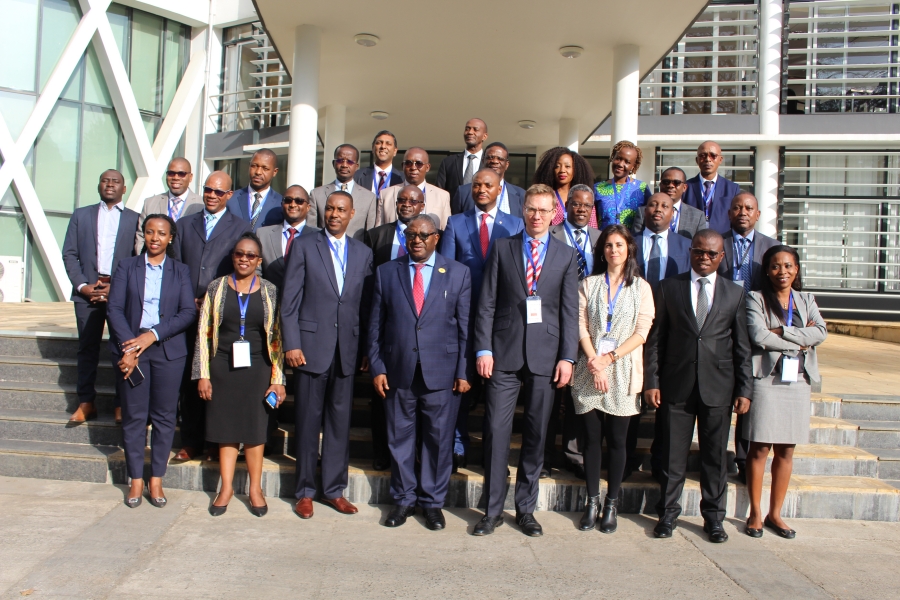 A group photo of participants at the 30th NEPAD-IPPF Oversight Committee Meeting outside the EAC Headquarters in Arusha, Tanzania.