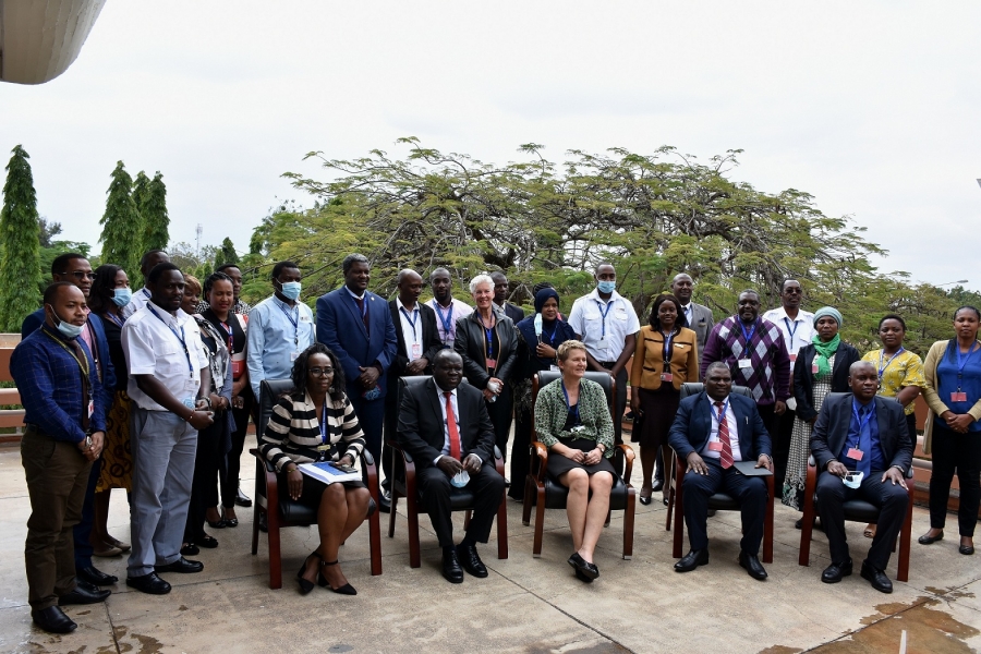 Hon Christophe Bazivamo EAC-Deputy Secretary General-Productive and Social Sectors, H.E. Regine Hess Germany Ambassador to Tanzania and EAC flanked by Kilimanjaro International Airport staff trainees.