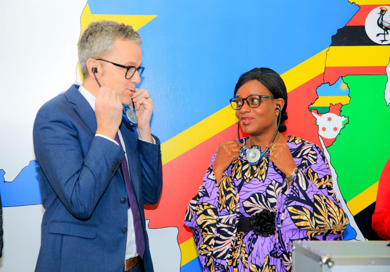  EAC Deputy Secretary General, Annette Ssemuwemba and Mr. Luc Blanco on behalf of French Ambassador test some of the equipment during the handover ceremony